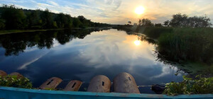 Занесло течением: в Днепропетровской области водолазы третьи сутки ищут тело мальчика в водоеме